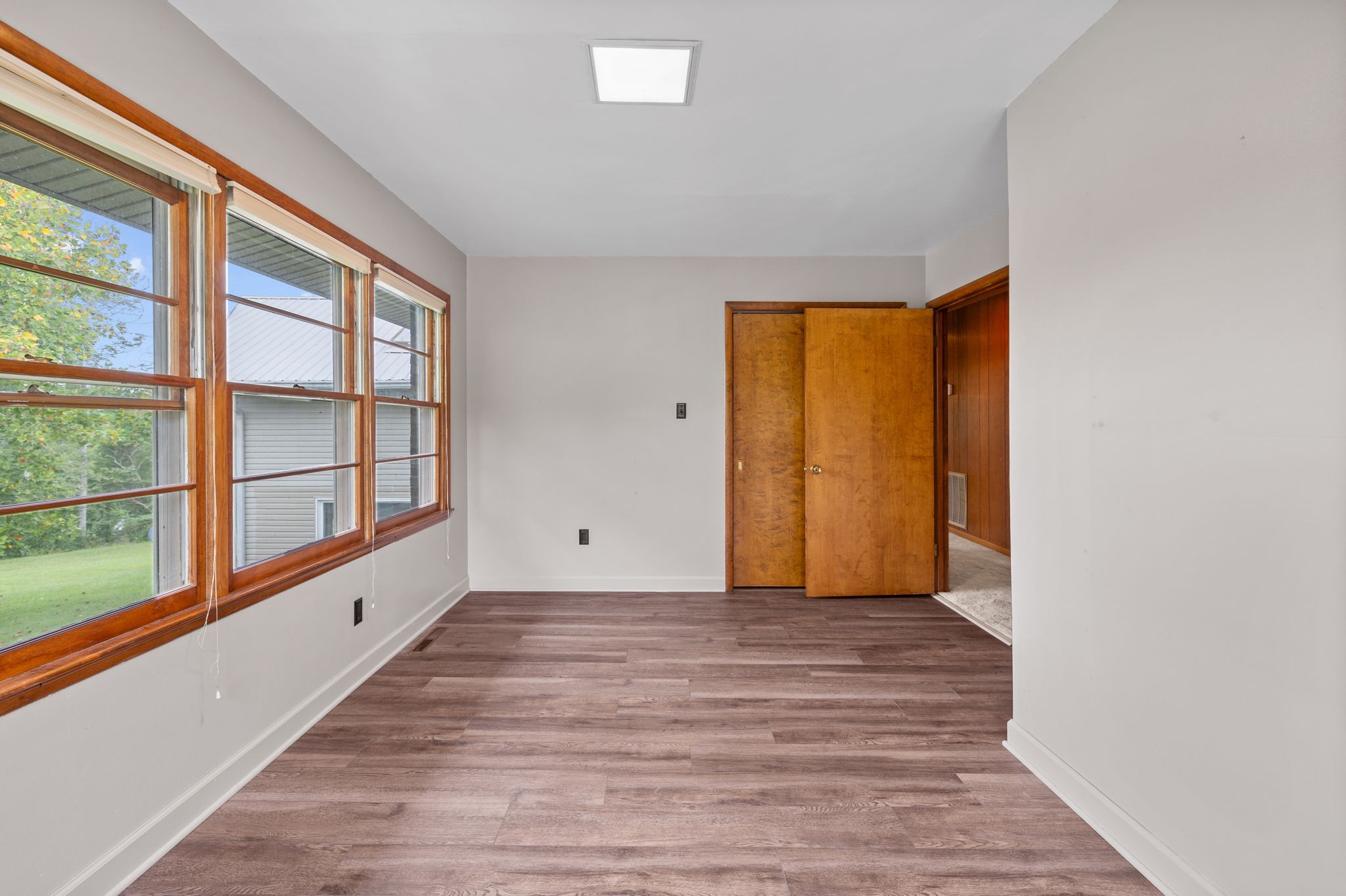 3443 Mann Road Lebanon, TN 37087 - Photo 53 of 55 a view of an empty room with wooden floor and a window
