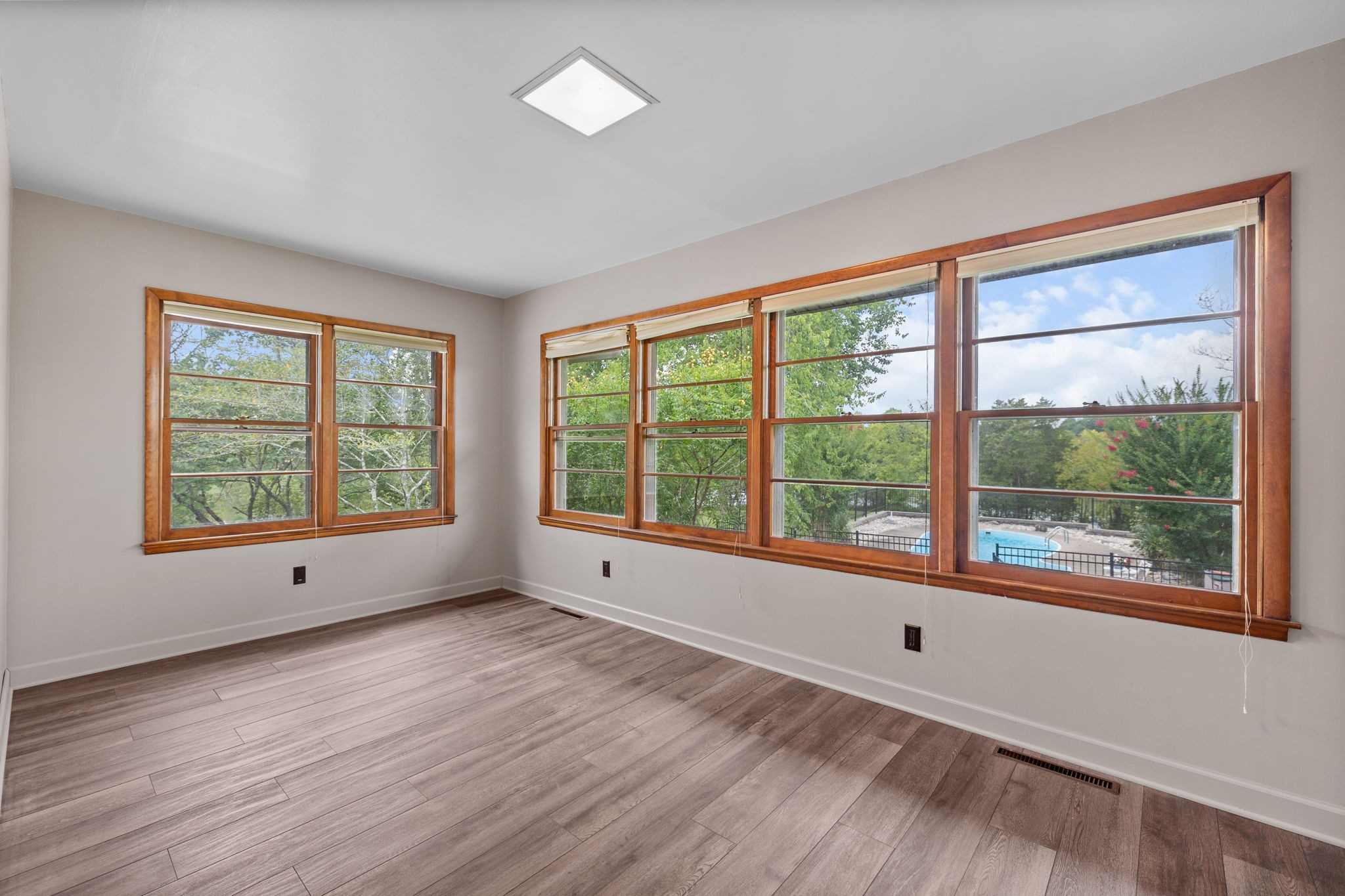 3443 Mann Road Lebanon, TN 37087 - Photo 54 of 55 a view of an empty room with wooden floor and a window