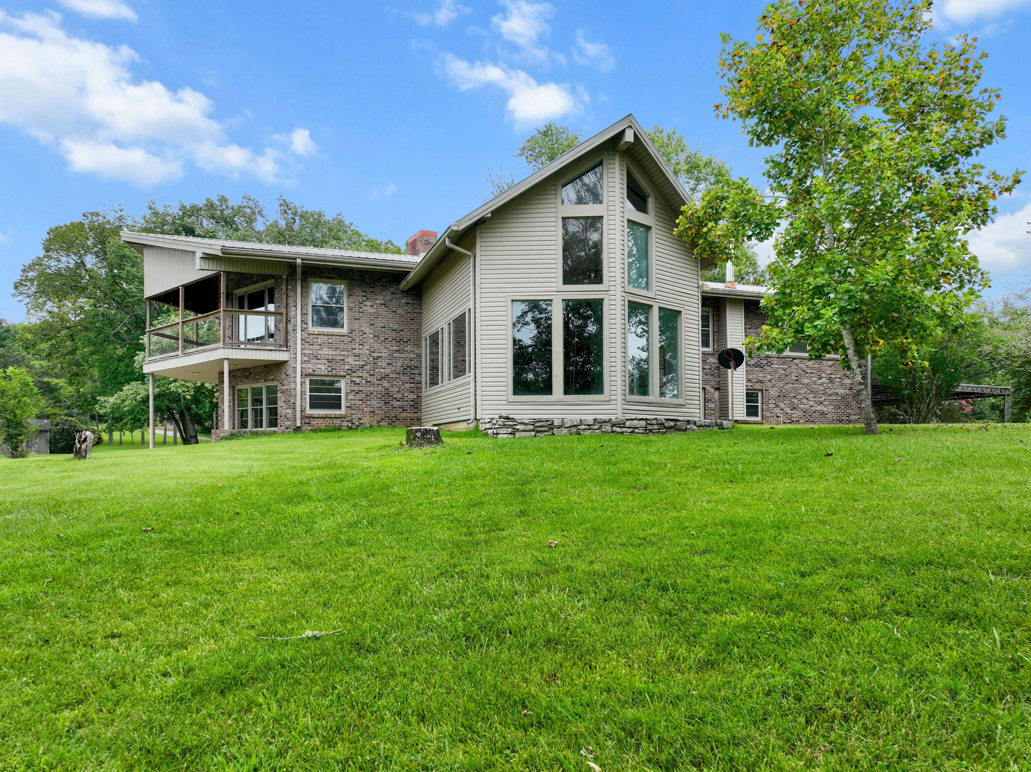 3443 Mann Road Lebanon, TN 37087 - Photo 8 of 55 a front view of a house with a garden and yard