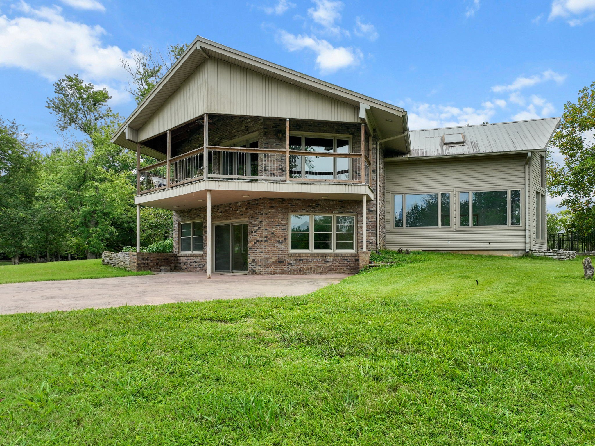 3443 Mann Road Lebanon, TN 37087 - Photo 9 of 55 a front view of a house with a garden and yard