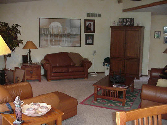 4428 Montclair Road Roscoe, IL 61073 - Photo 5 of 6 a living room with furniture and a window