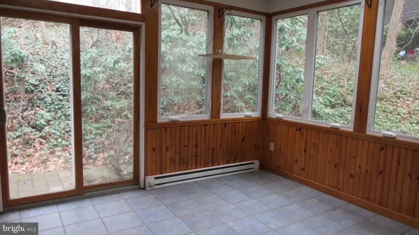 a view of a room that has a large window