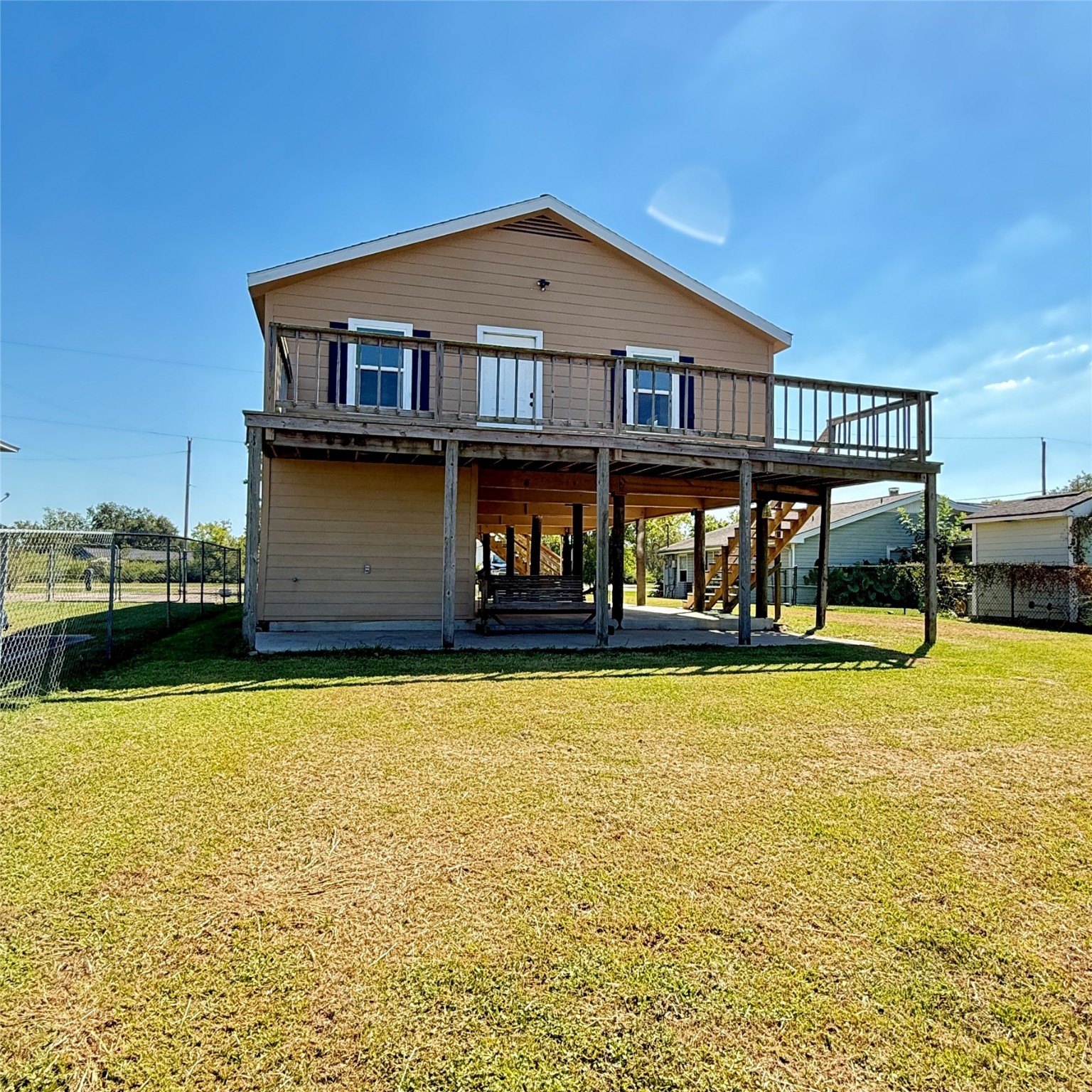 143 Bastrop Bayou Drive Angleton, TX 77515 - Photo 11 of 32 a front view of a house with swimming pool