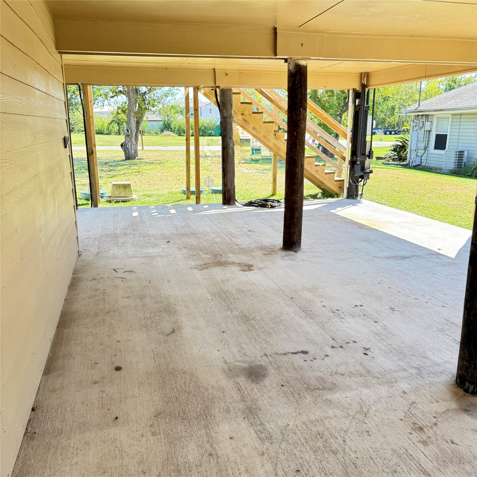 143 Bastrop Bayou Drive Angleton, TX 77515 - Photo 13 of 32 a view of an empty room with large windows
