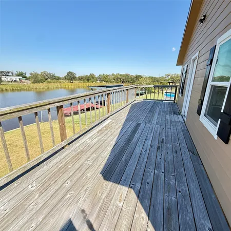 a view of wooden balcony with city view
