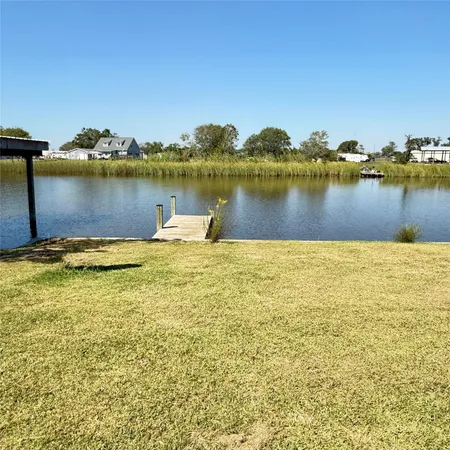 a view of a lake with houses