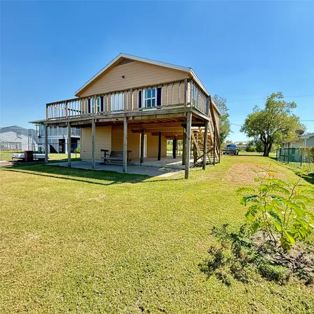 a front view of a house with swimming pool