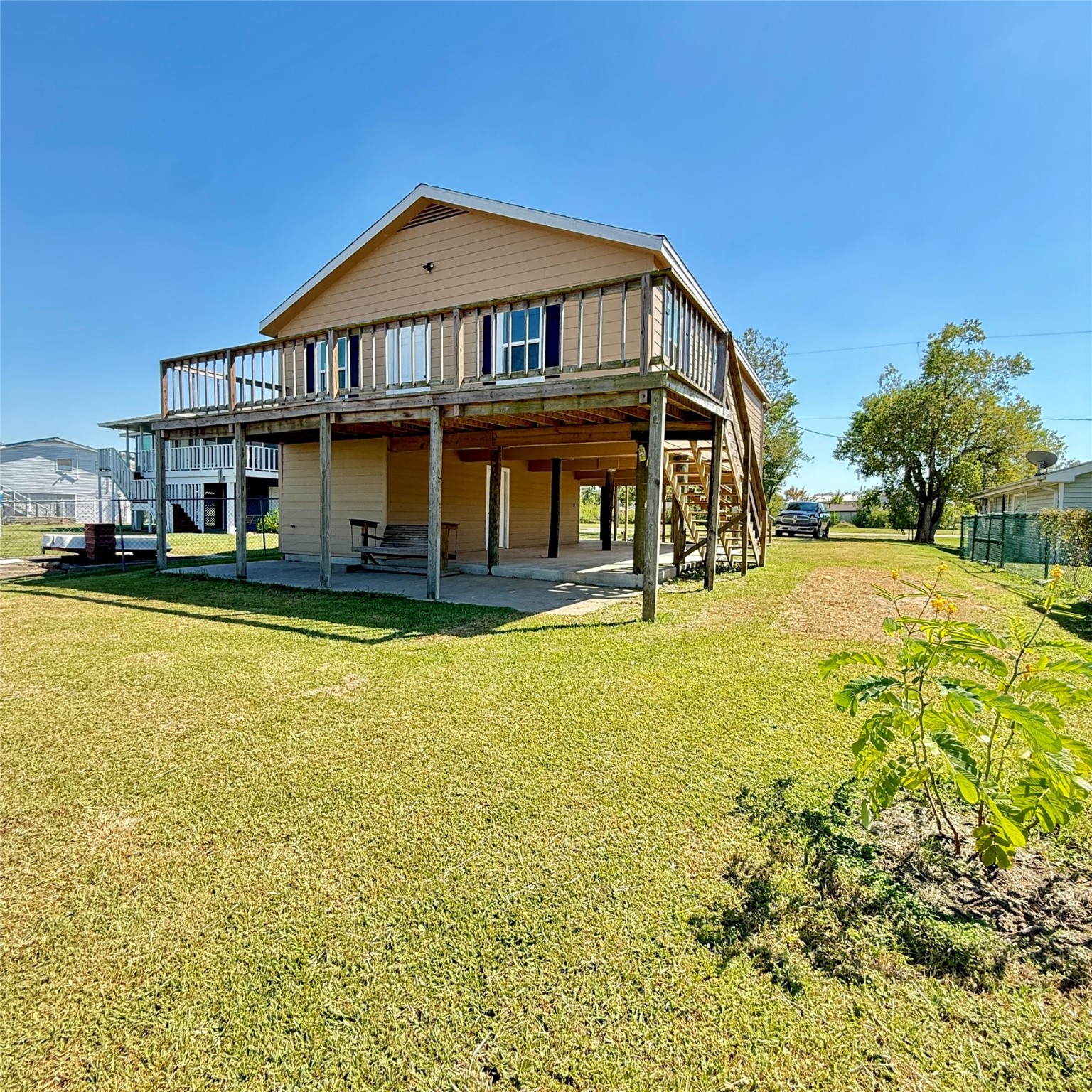 143 Bastrop Bayou Drive Angleton, TX 77515 - Photo 9 of 32 a front view of a house with swimming pool