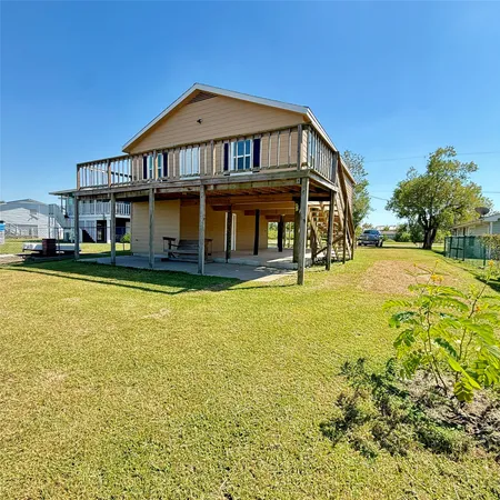 a front view of a house with swimming pool