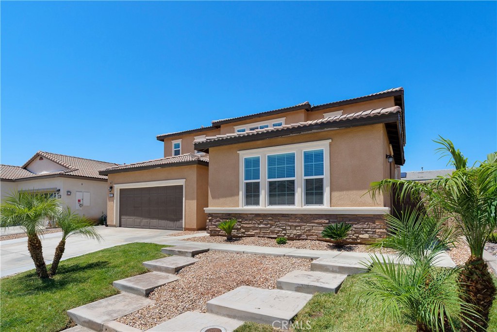 34727 Ribbon Grass Way Murrieta, CA 92563 - Photo 33 of 54 Front exterior features welcoming steps leading to two separate entrances—enhancing both curb appeal and functionality