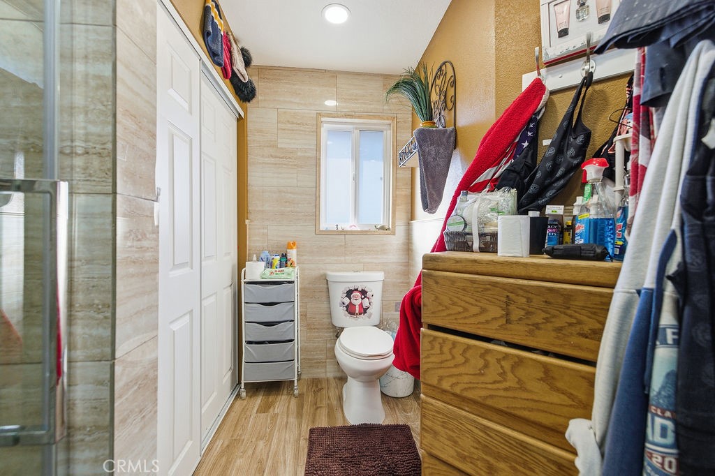 5390 Karling Place Palmdale, CA 93552 - Photo 12 of 36 a bathroom with a toilet and a shower