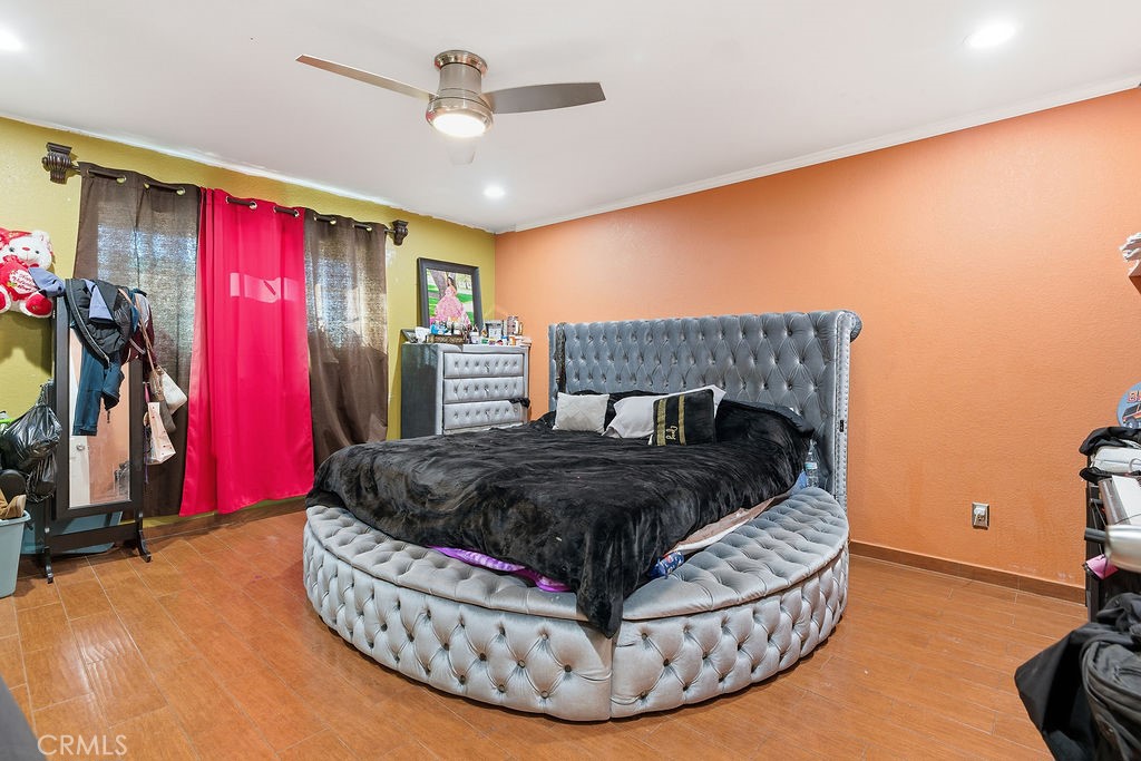 5390 Karling Place Palmdale, CA 93552 - Photo 15 of 36 a living room with furniture and a flat screen tv