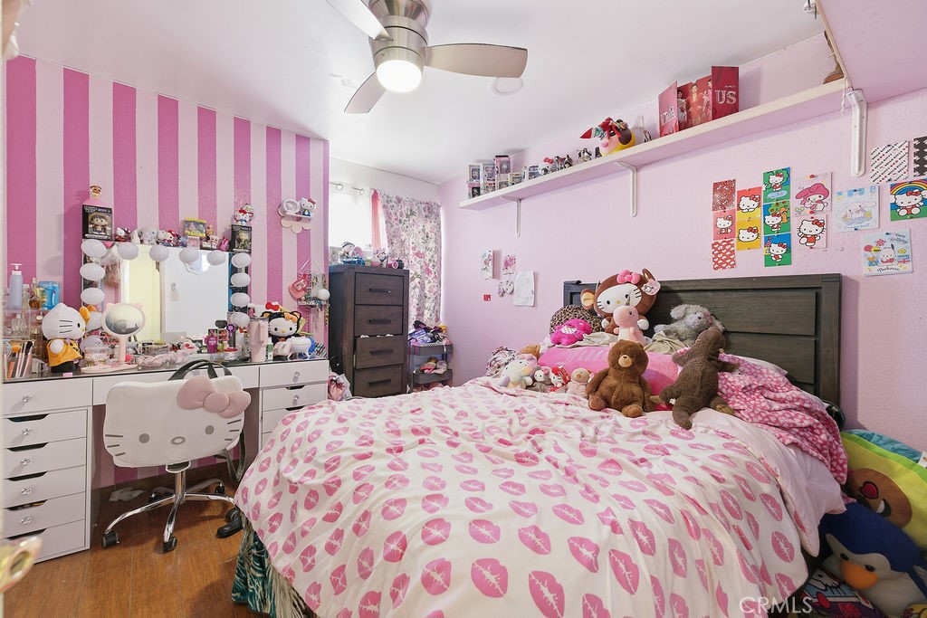 5390 Karling Place Palmdale, CA 93552 - Photo 17 of 36 a bedroom with a bed and furniture