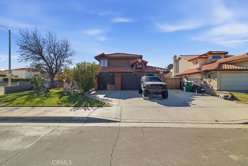 5390 Karling Place Palmdale, CA 93552 - Photo 35 of 36 a car parked on the side of the road