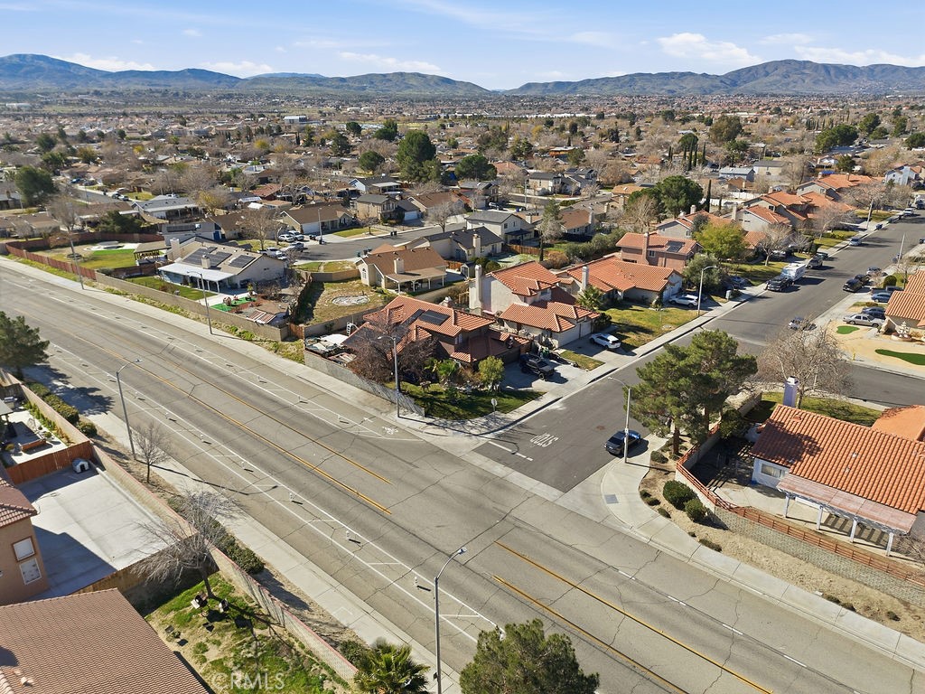 5390 Karling Place Palmdale, CA 93552 - Photo 5 of 36 an aerial view of residential houses with outdoor space