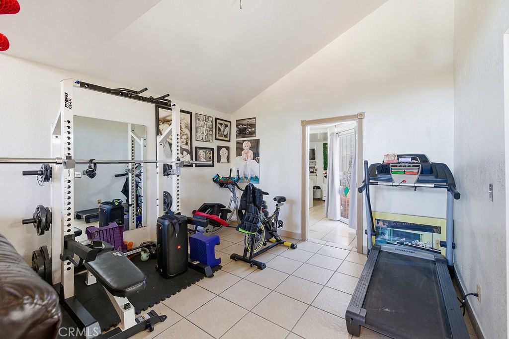 5390 Karling Place Palmdale, CA 93552 - Photo 10 of 36 a view of a room with gym equipment