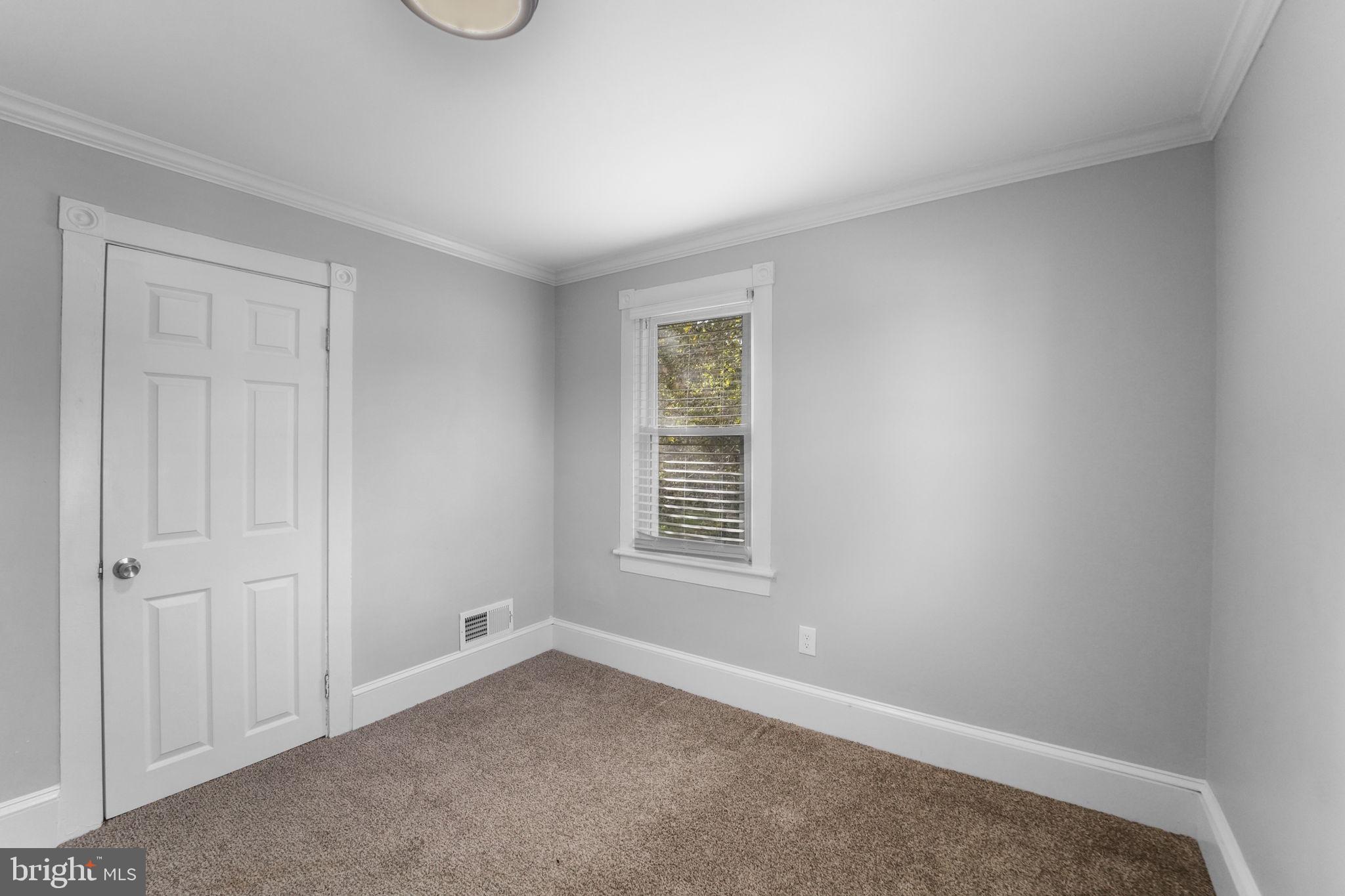 2652 South Main Road Vineland, NJ 08360 - Photo 28 of 44 an empty room with a window