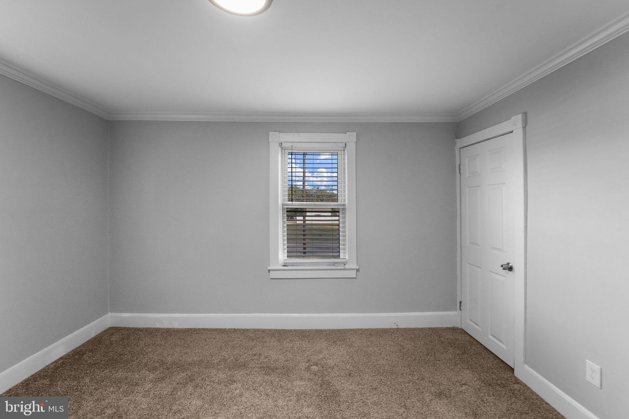 2652 South Main Road Vineland, NJ 08360 - Photo 30 of 44 a view of an empty room with a window