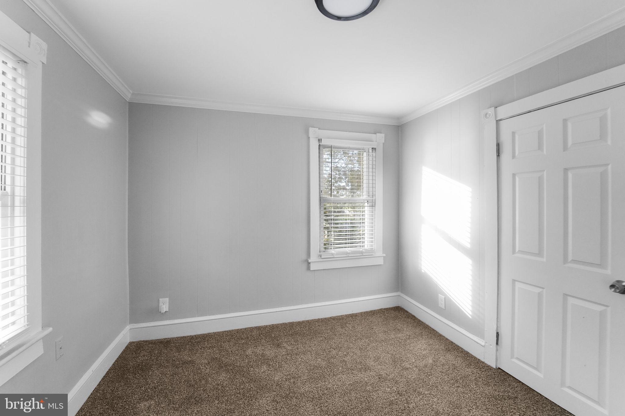 2652 South Main Road Vineland, NJ 08360 - Photo 32 of 44 an empty room with windows