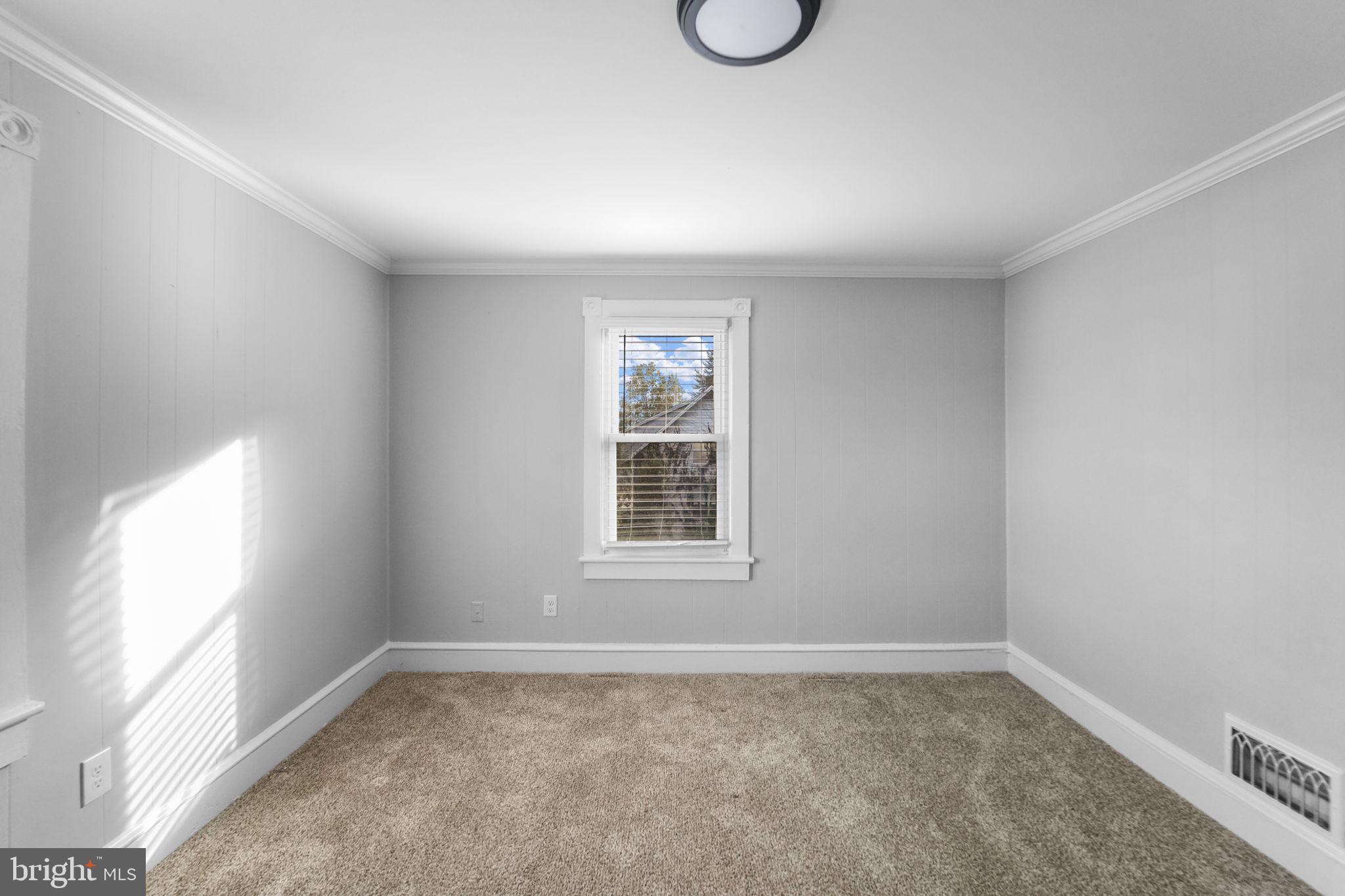 2652 South Main Road Vineland, NJ 08360 - Photo 35 of 44 an empty room with a window