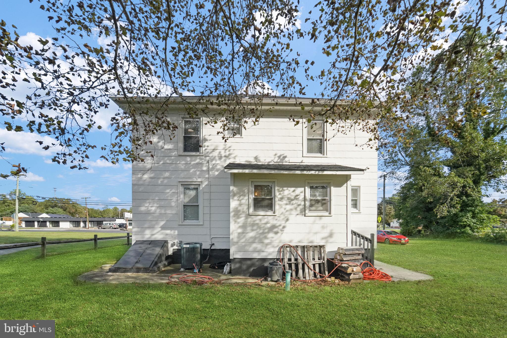 2652 South Main Road Vineland, NJ 08360 - Photo 8 of 44 a front view of a house with garden