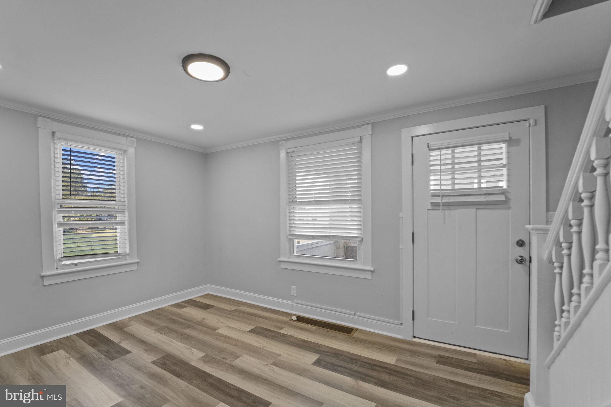 2652 South Main Road Vineland, NJ 08360 - Photo 9 of 44 a view of empty room with wooden floor and fan