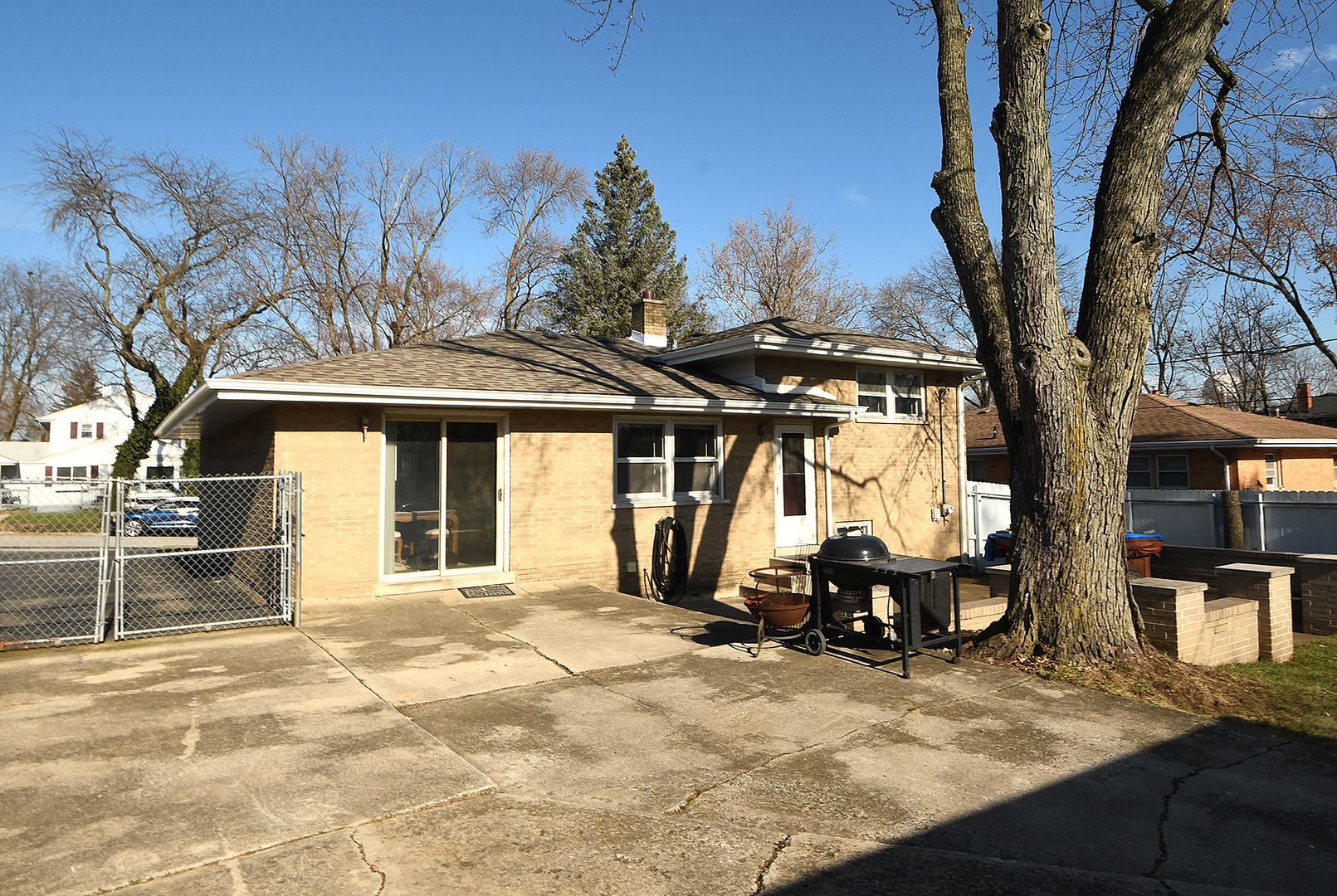 1423 Hillview Road Homewood, IL 60430 - Photo 21 of 23 a view of a house with backyard porch and sitting area