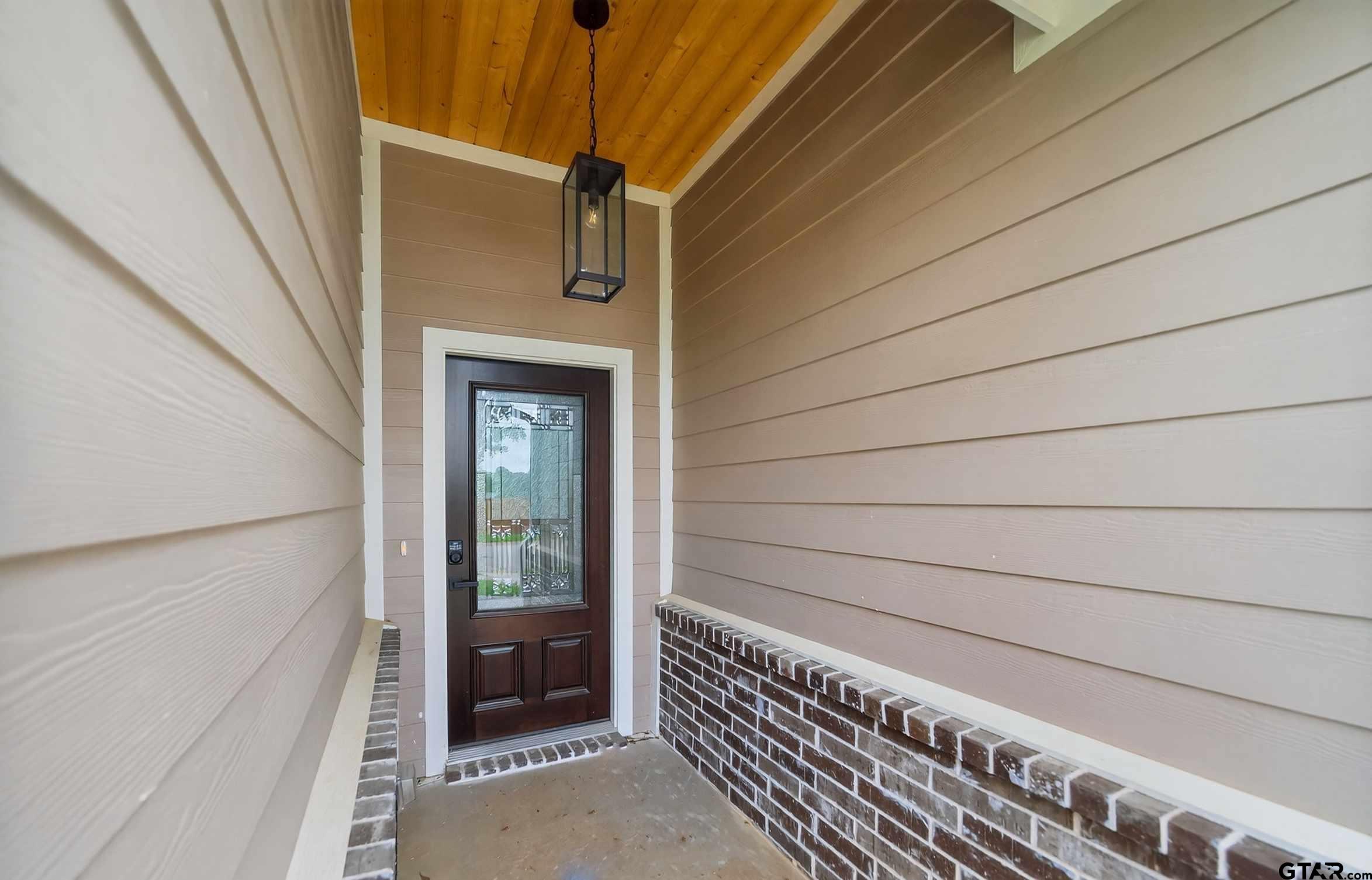 3049 Guinn Farms Road Tyler, TX 75707 - Photo 3 of 43 a view of front door of a house