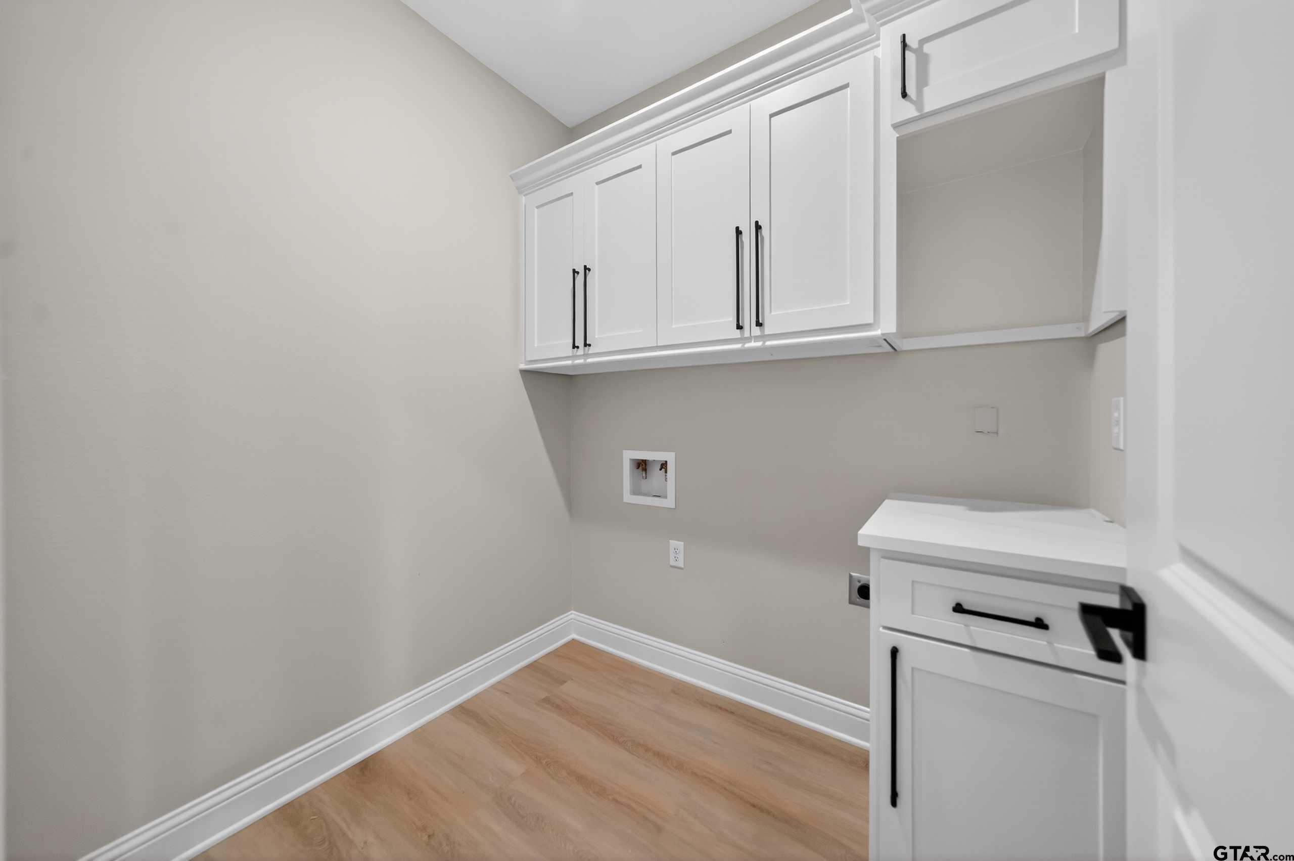 3049 Guinn Farms Road Tyler, TX 75707 - Photo 39 of 43 a view of a room with wooden floor