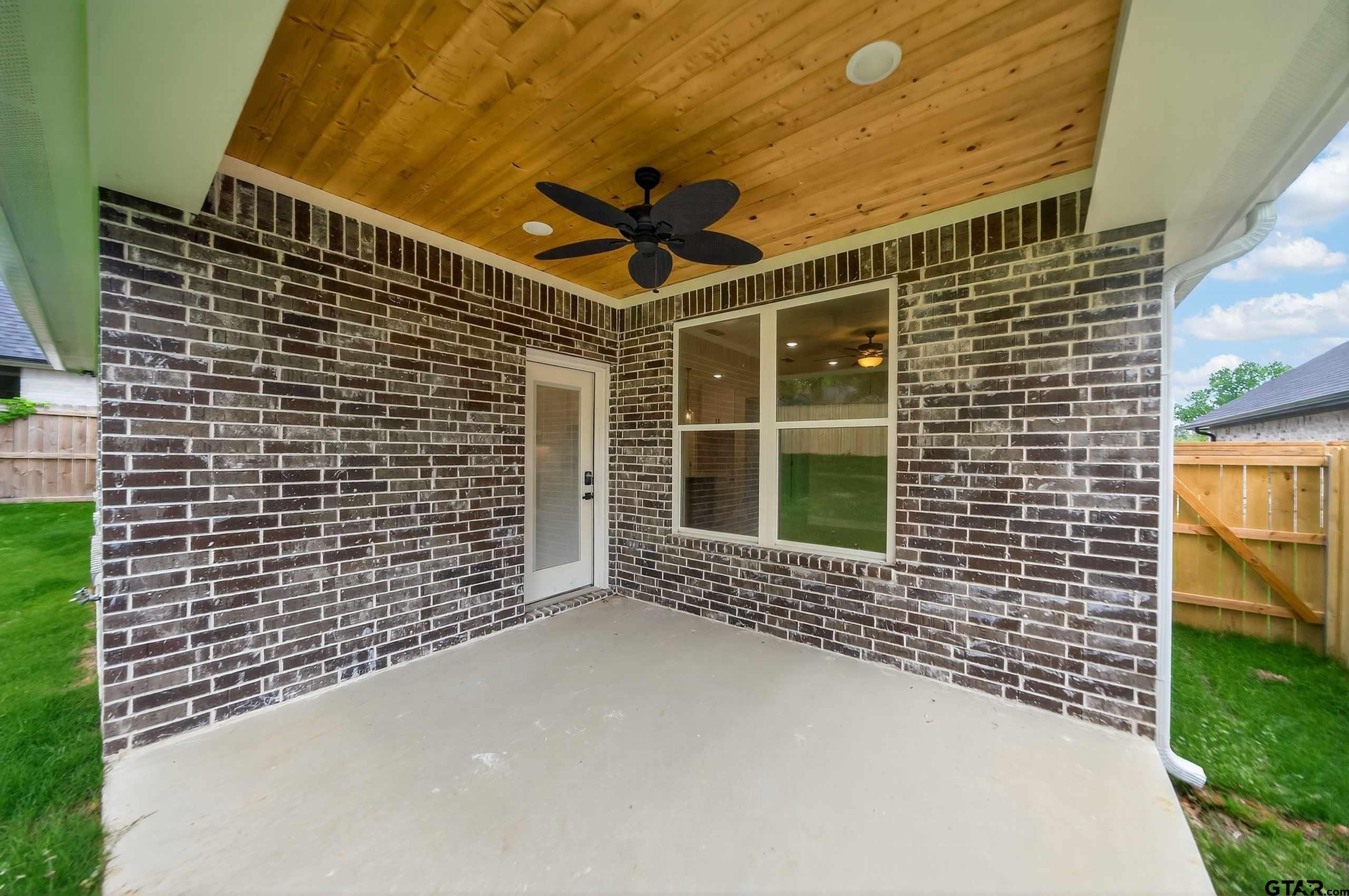 3049 Guinn Farms Road Tyler, TX 75707 - Photo 43 of 43 a view of a balcony with a potted plant