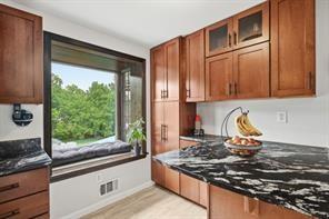 283 Brookwood Road Venetia, PA 15367 - Photo 10 of 36 a kitchen with granite countertop a stove and a sink