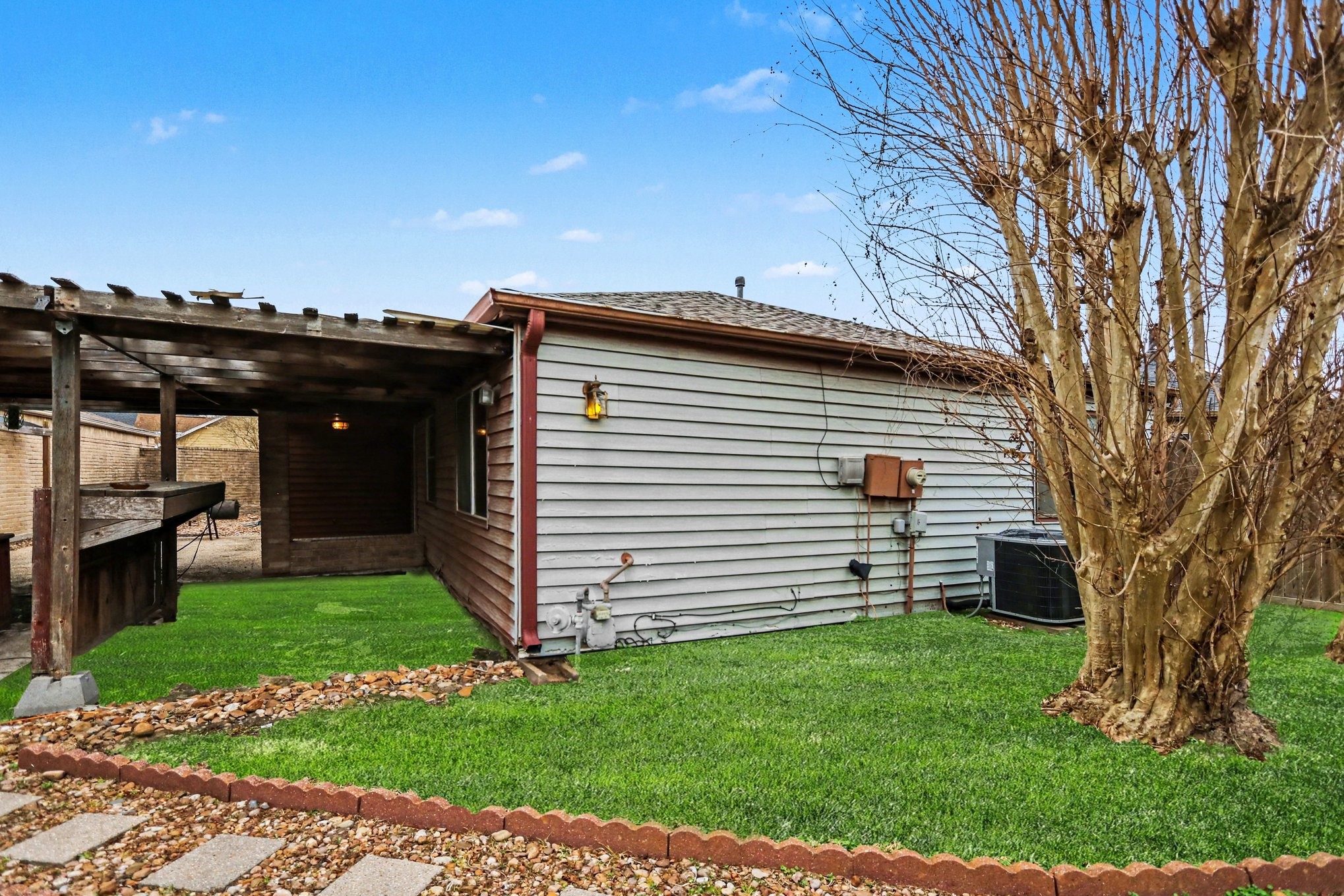 12151 Swords Creek Road Houston, TX 77067 - Photo 20 of 20 a view of a house with a backyard