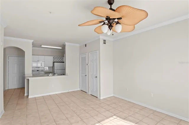 a view of a kitchen with a sink cabinets and appliances