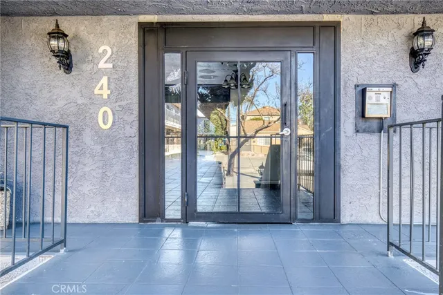 an entryway at livingroom with furniture and wooden floor
