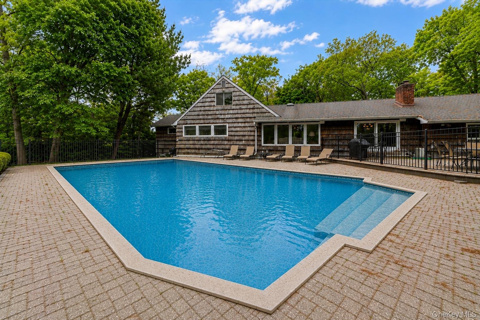 6 Apex Road Melville, NY 11747 - Photo 44 of 50 swimming pool view with a outdoor space