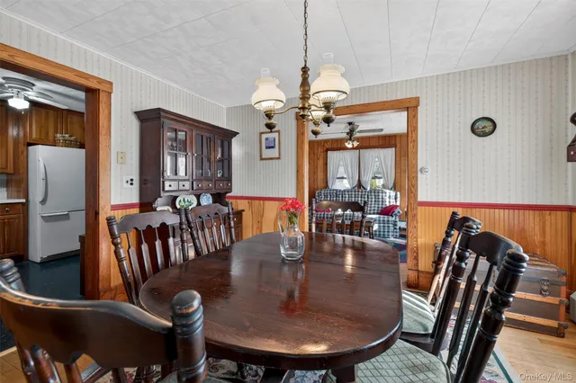 a view of a dining room with furniture
