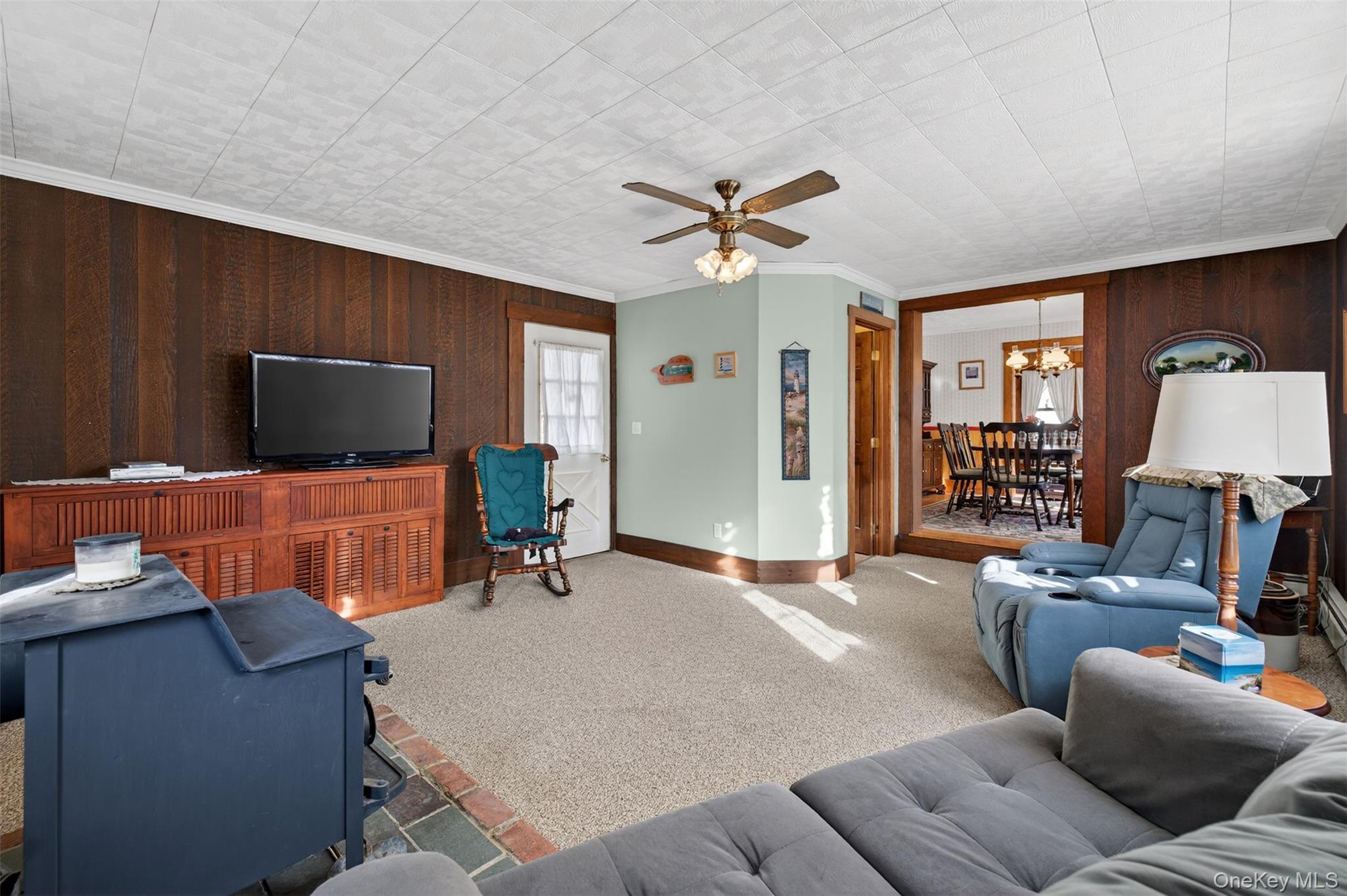 21 Innis Avenue Newburgh, NY 12550 - Photo 14 of 22 a living room with furniture and a flat screen tv