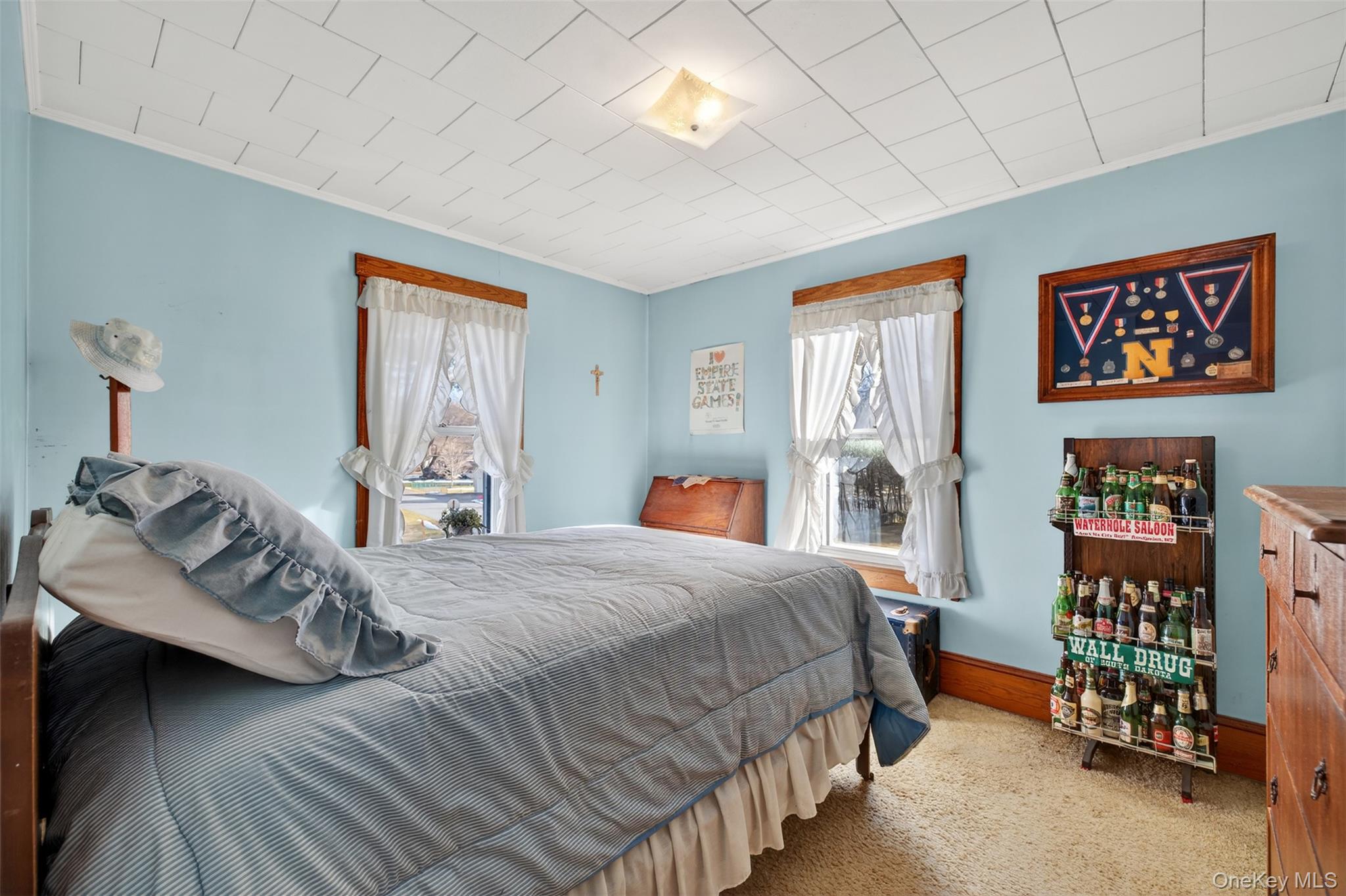 21 Innis Avenue Newburgh, NY 12550 - Photo 16 of 22 a bedroom with a bed and a window