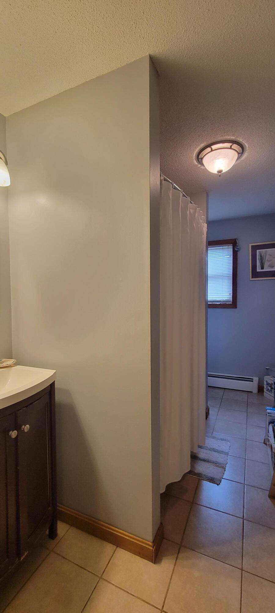 68 Oak Street Waterville, ME 04901 - Photo 8 of 18 08. First Floor Bathroom