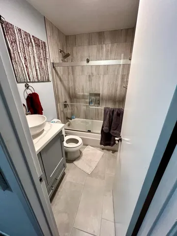 a bathroom with a sink and a toilet