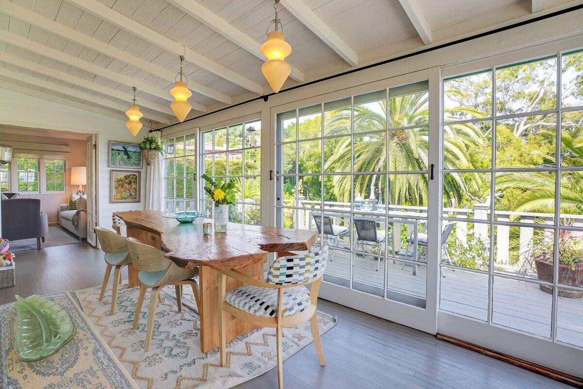 0 Medio Road Santa Barbara, CA 93103 - Photo 13 of 20 a view of a dining room with furniture large windows and wooden floor