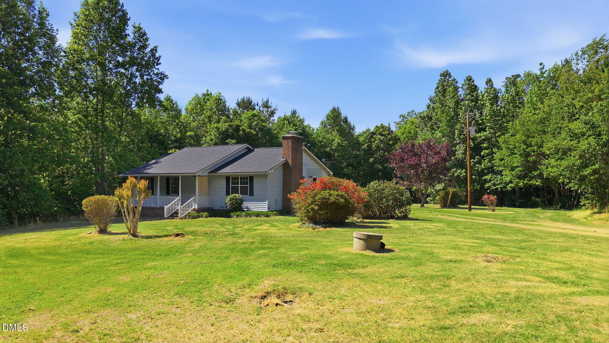 3602 Harrison Road Castalia, NC 27816 - Photo 6 of 48 a house view with a garden space