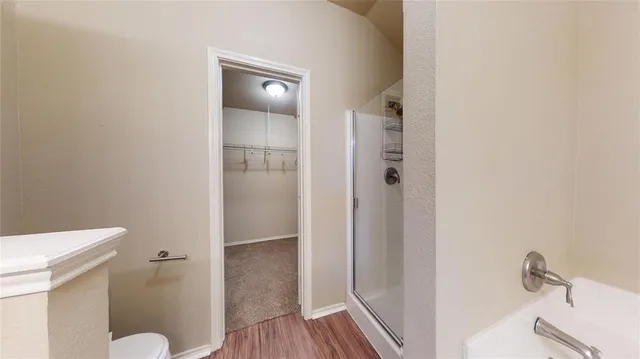 a bathroom with a sink and toilet