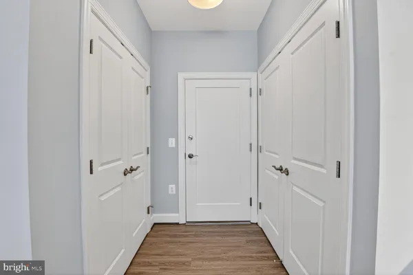 a view of a room with racks on the wall
