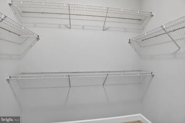 a view of a bathroom from a hallway