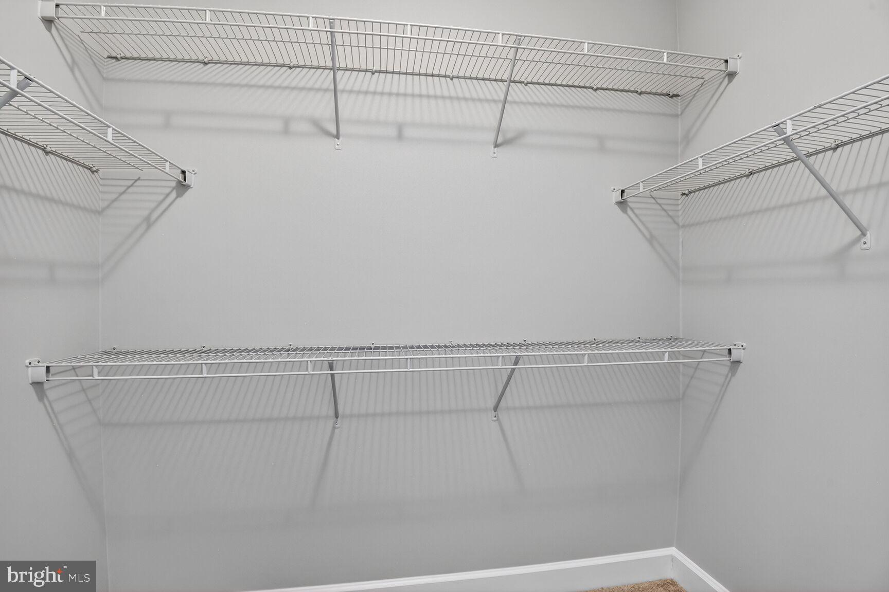 10530 Resort Road, Unit 210 Ellicott City, MD 21042 - Photo 14 of 35 a view of a room with racks on the wall