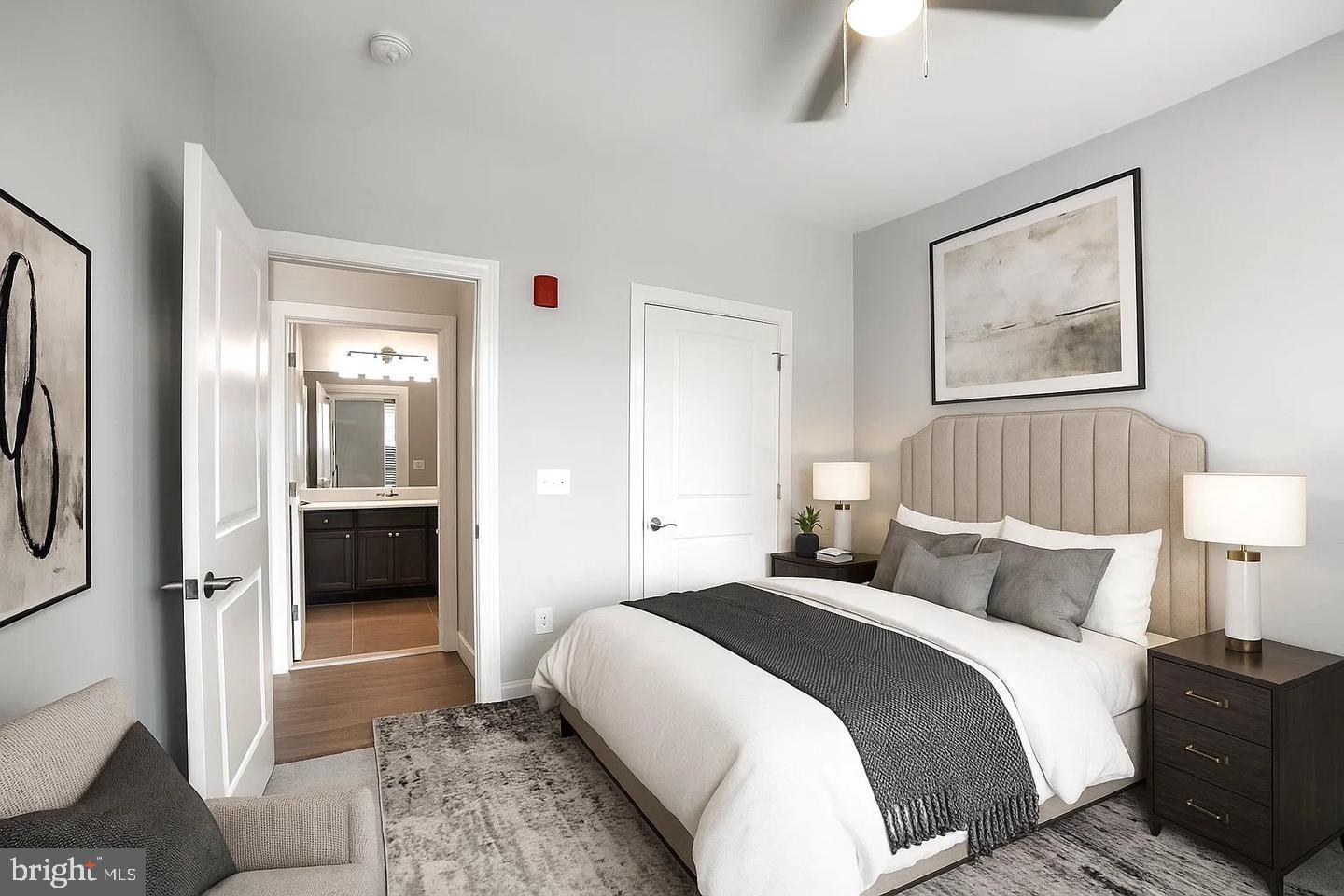 10530 Resort Road, Unit 210 Ellicott City, MD 21042 - Photo 19 of 35 a bedroom with a bed and a view of bedroom