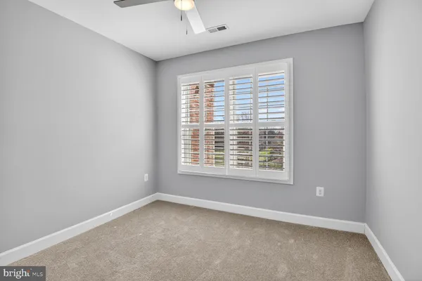 wooden floor and view of an empty room