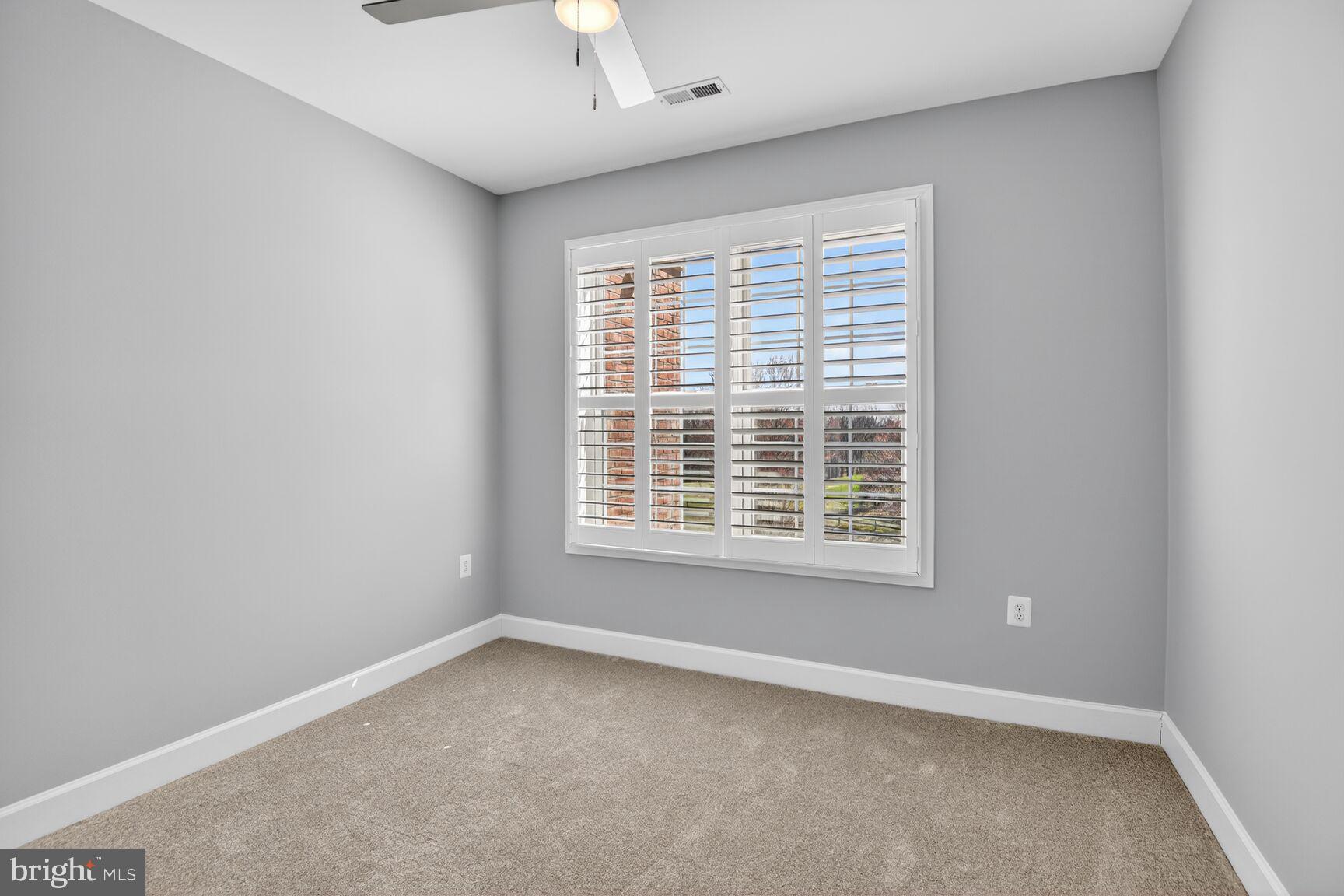 10530 Resort Road, Unit 210 Ellicott City, MD 21042 - Photo 20 of 35 an empty room with a window