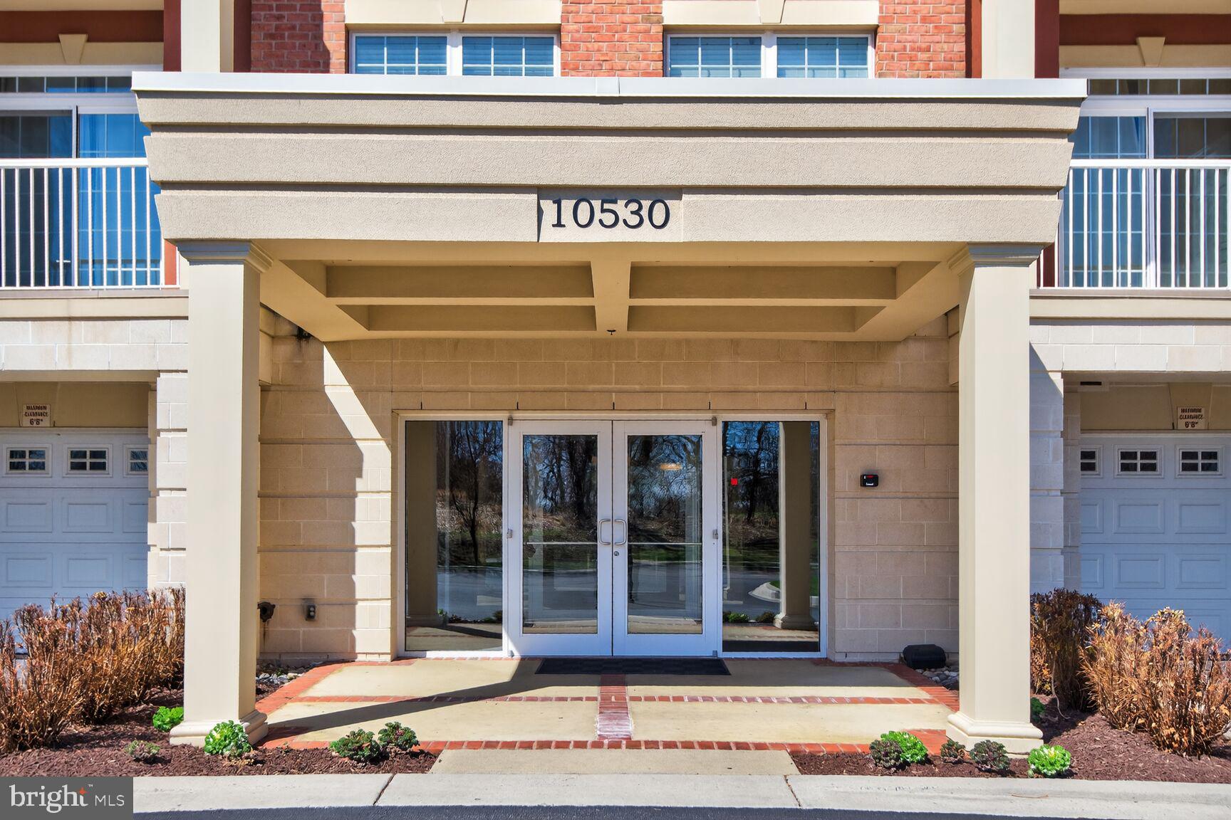 10530 Resort Road, Unit 210 Ellicott City, MD 21042 - Photo 2 of 35 a view of a door of the building